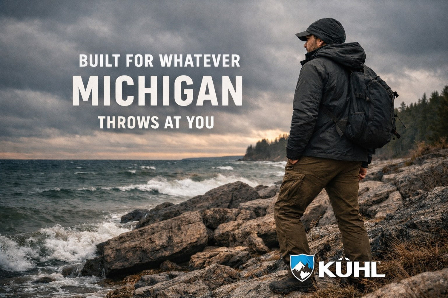 man wearing kuhl clothing on windy lake michigan shoreline outdoor lifestyle spring conditions
